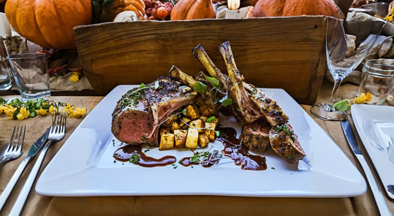 Maple, Rosemary and Apple Brined Rack of Lamb with Minted Port Glaze and Herb Roasted Celeriac