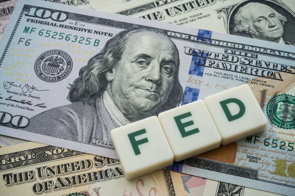 The Federal Reserve ( FED ) over dollar bills