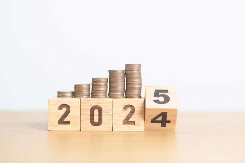 2024 end year to Happy New Year 2025 with Coins stack. Money, Budget, tax, investment, financial, savings and New Year Resolution concepts